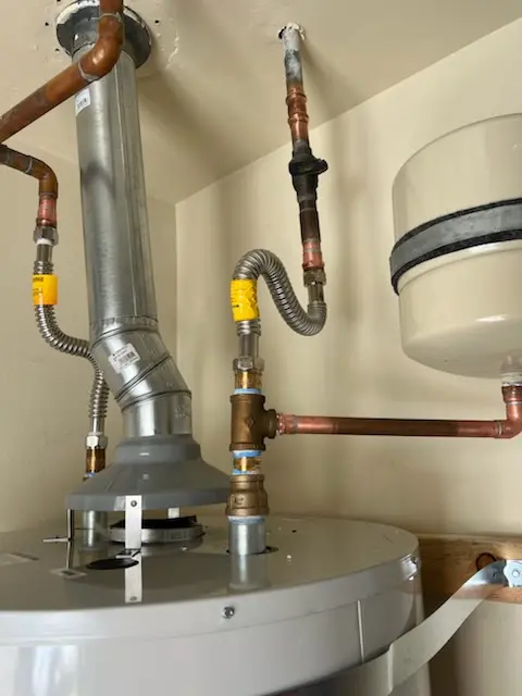 Water heater installation and plumbing repair in Masonicus